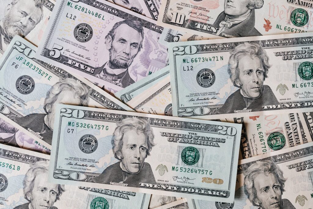 Emergency room technician salary — stacks of dollar bills